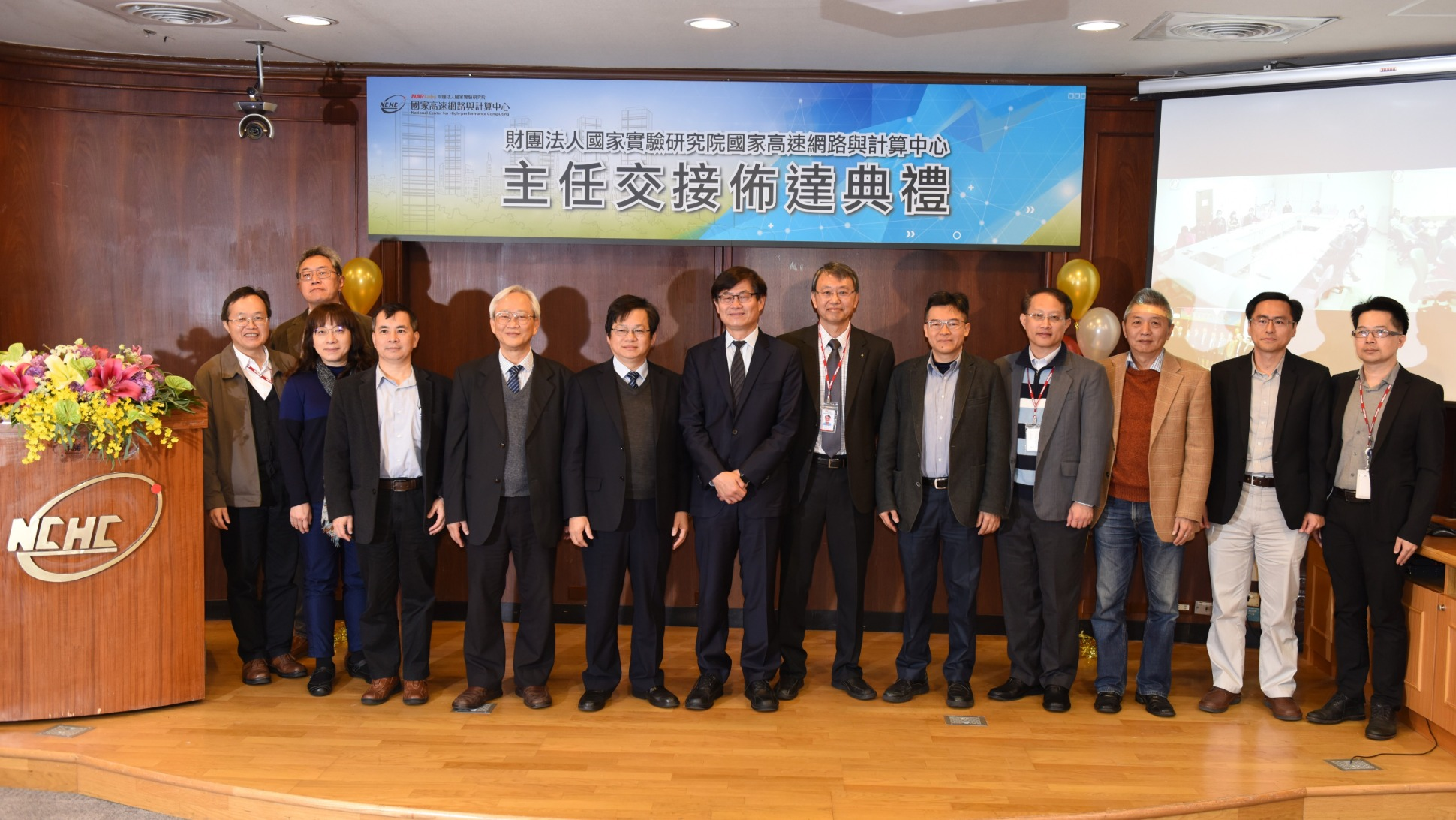 All attendees of the ceremony pose for a group photo